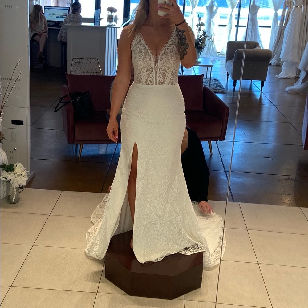 Wedding dress by evie young- style is breeze